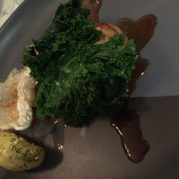 Roasted Golden Plains Suckling Pig saddle, steamed kale, confit cocktail kiplfer potato, yakiniku bbq pork sauce.